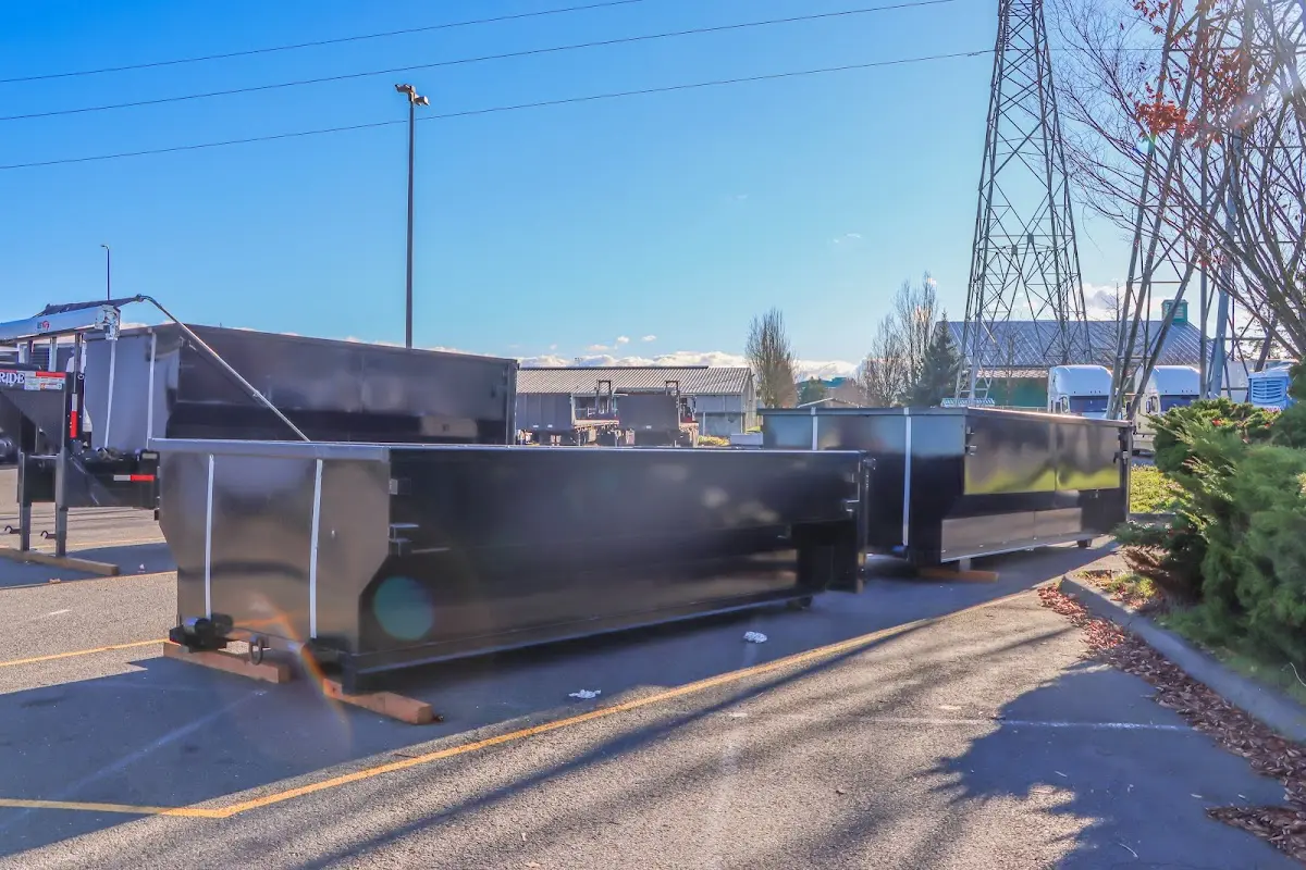 Roll-off dumpster ready for waste disposal at job site for Roofing Dumpster Rental in West Puente Valley